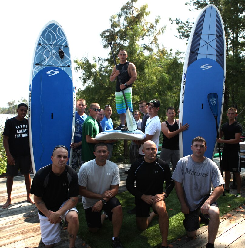 Marines with company B, the winners of July’s Commander’s Cup Challenge, pose for a photo together July 20 at the Gottschalk Marina aboard Marine Corps Base Camp Lejeune. Company B celebrated the victory with former company first sergeant, 1st Sgt. Dustin Kazmar, in his last Commander’s Cup Challenge with Headquarters and Support Battalion.