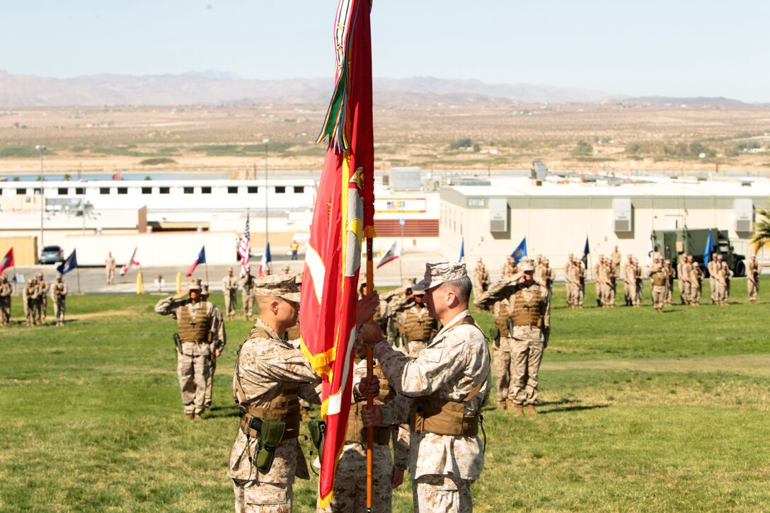 Lt. Col. Kevin F. Murray receives command of Marine Unmanned Aerial Vehicle Squadron 1 from Lt. Col. John B. Barranco.