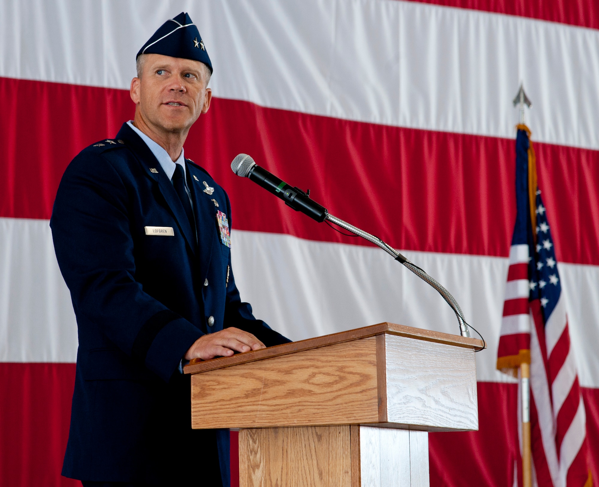 U.S. Air Force Maj. Gen. Jeffrey Lofgren, U.S. Air Force Warfare Center commander, addresses the crowd after assuming command of the USAFWC at a ceremony July 20, 2012, at Nellis Air Force Base, Nev. Lofgren is a command pilot with more than 3,000 flight hours in the F-16, KC-10 and training aircraft. (U.S. Air Force photo by Master Sgt. Jason W. Edwards/Released)