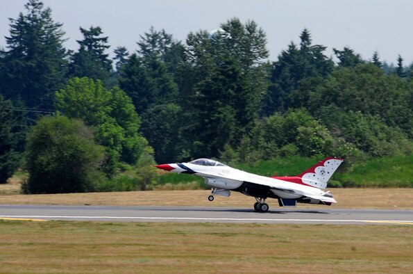 An F-16 Fighting Falcon with the U.S. Air Force Thunderbirds lands July 19, 2012, at Joint Base Lewis-McChord, Wash. The demonstration team will be one of the headliners for the 2012 Joint Base Lewis-McChord Air Expo. (U.S. Air Force photo/Adamarie Lewis-Page) 