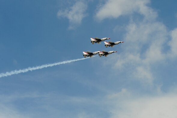 The U.S. Air Force Thunderbirds arrive July 19, 2012, at McChord Field, Wash., just in time for the 2012 Joint Base Lewis-McChord Air Expo. (U.S. Air Force photo/Adamarie Lewis-Page)
