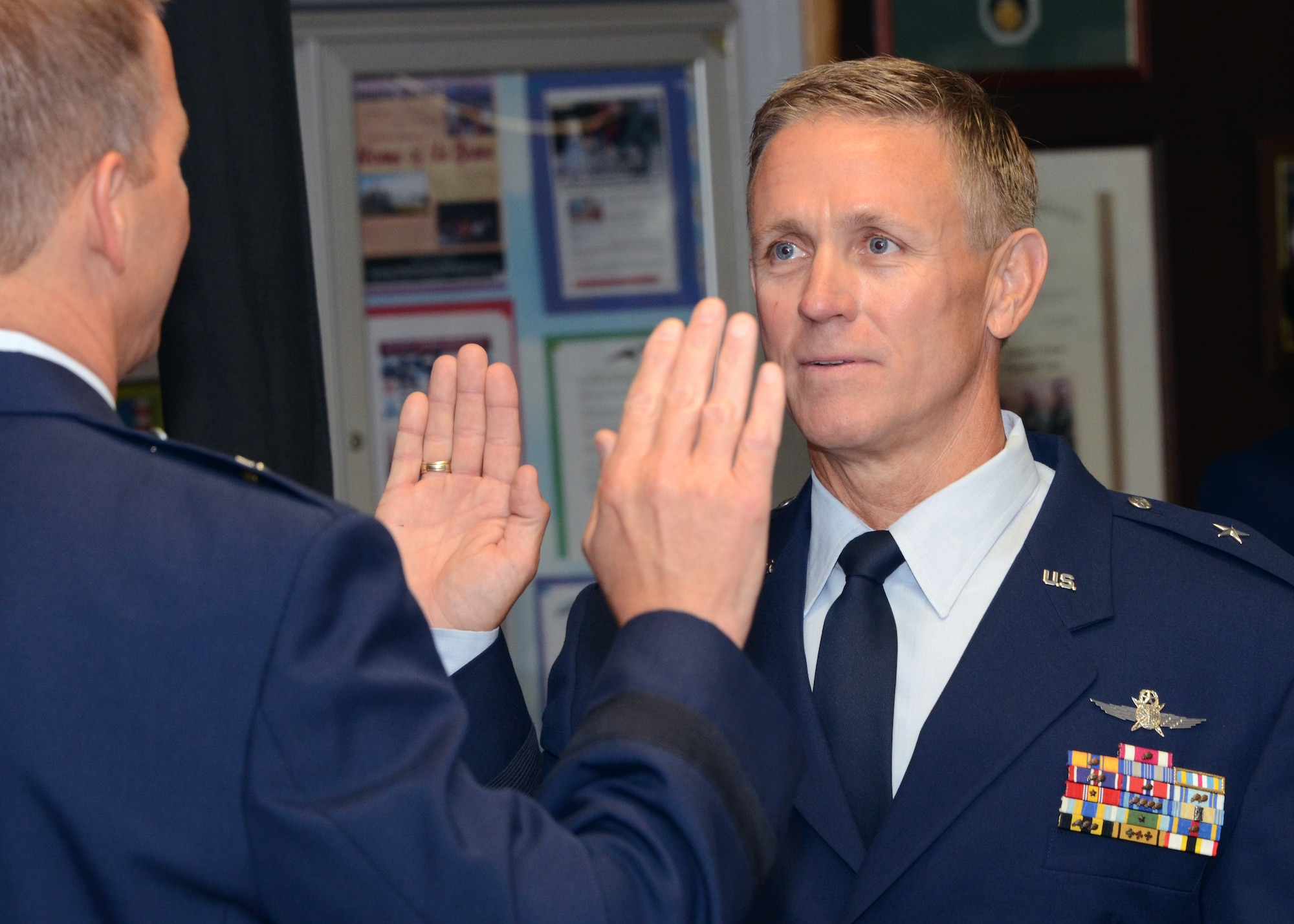 U.S. Air Force Brig. Gen. Paul C. Maas Jr., Chief of Staff, Maryland Air
National Guard, right, recites the Commissioning Oath given by U.S. Air
Force Brig. Gen. Scott Kelly, 175th Wing Commander, during a promotion
ceremony at Warfield Air National Guard Base, Baltimore, Md., on July 20,
2012.  Maas who was promoted to Brigadier General was joined by family and
friends. (National Guard photo by Staff Sgt. Benjamin Hughes)
