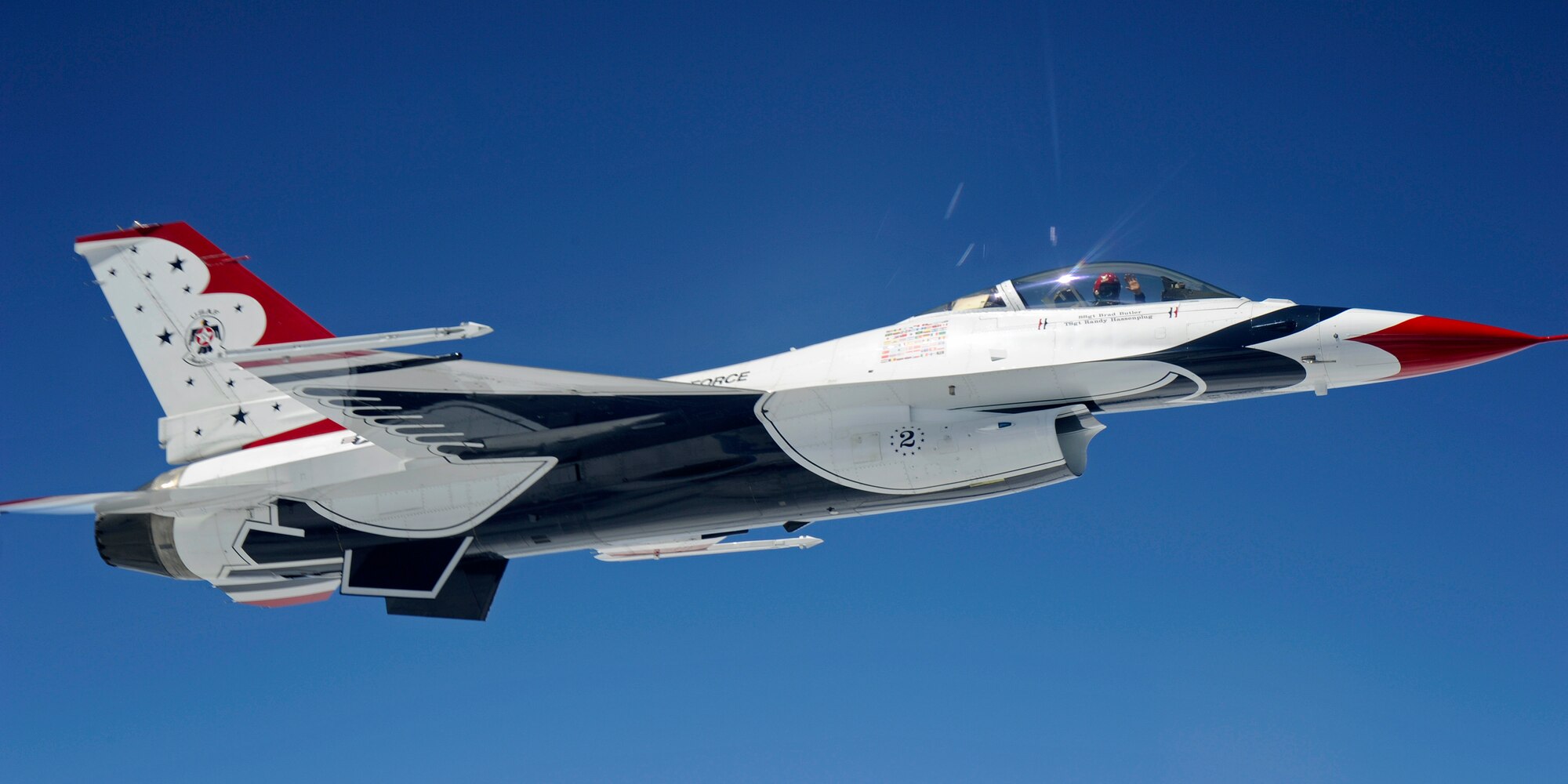 An F-16 Fighting Falcon with the U.S. Air Force Aerial Demonstration Squadron Thunderbirds flys alongside a KC-135 Stratotanker from Fairchild Air Force Base, Wash., July 19, 2012. The Thunderbirds are making their way to the Joint Base Lewis-McChord Air Expo at McChord Field, July 21 to 22. (U.S. Air Force photo by Airman 1st Class Ryan Zeski)