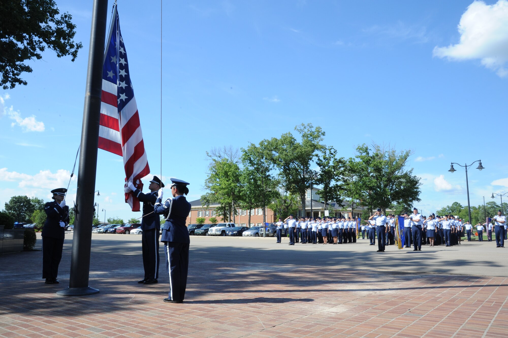 The Columbus Air Force Base honor guard and members of the 14th Flying Training Wing hold a wing retreat ceremony at Smith Plaza on July 16. The sounding of Retreat traditionally signals the end of the duty day. (U.S. Air Force photo/Senior Airman Chase Hedrick)