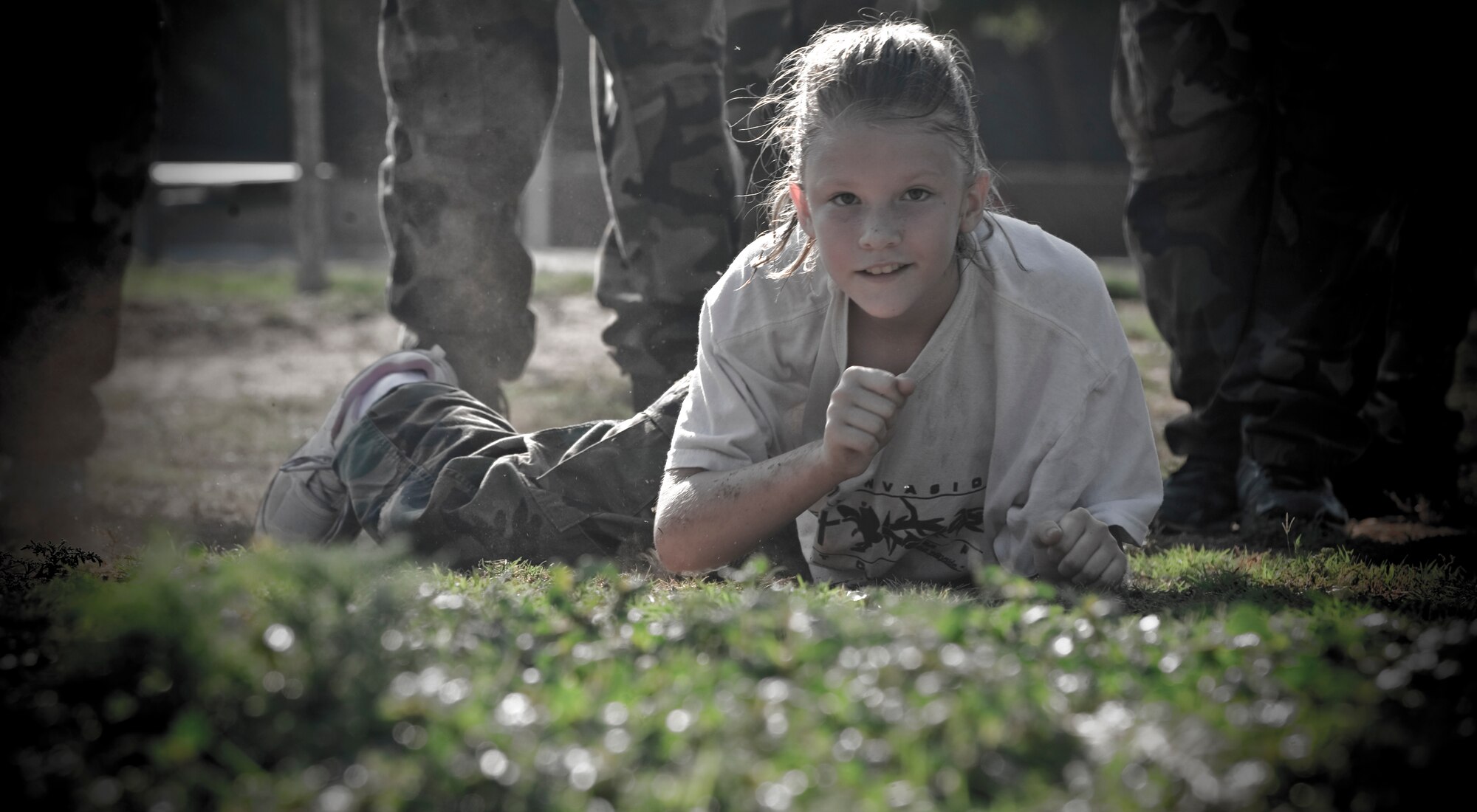 Brianna Cooley, 9, high crawls during a team building exercise while in the Reality Invasion program July 14, 2012, in Abilene, Texas. Reality Invasion is a volunteer ran program assisted by Dyess Airmen to help children who have disciplinary problems grow into young leaders. (U.S. Air Force photo by Airman 1st Class Jonathan Stefanko/ Released)