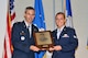 McGHEE TYSON AIR NATIONAL GUARD BASE, Tenn. - Senior Airman Brennan M. Gill, right, receives the John L. Levitow honor award for Airman Leadership School Class 12-6 at the I.G. Brown Training and Education Center from Timothy J. Cathcart, commander, July 19, 2012. The John L. Levitow award is the highest honor awarded a graduate of any Air Force enlisted professional military education course. (National Guard photo by Master Sgt. Kurt Skoglund/Released) 