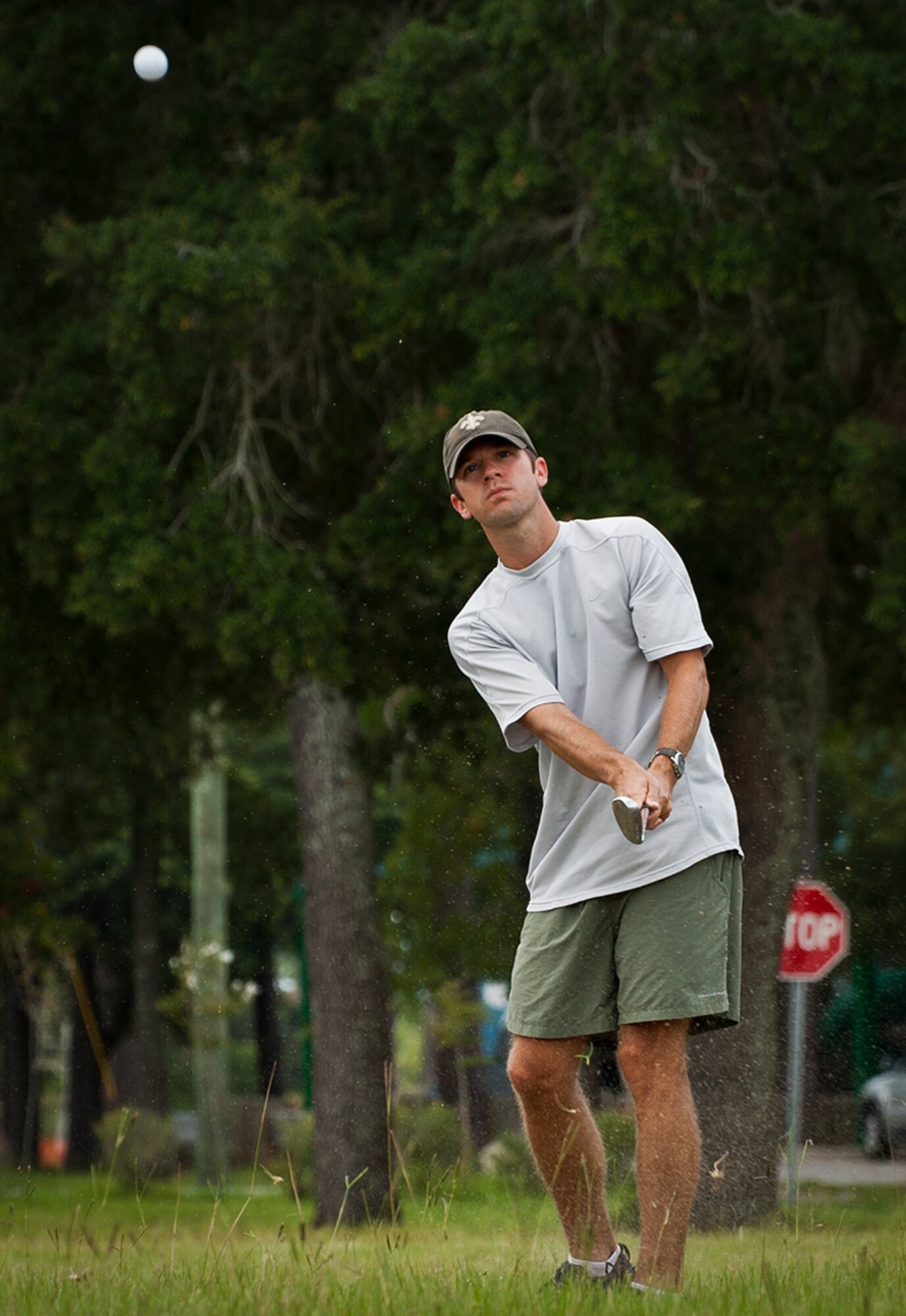 Jim LaRue watches to see if his shot gets “closest to the cone” during the Air Force Seek Eagle’s Olympics July 19 at Eglin Air Force Base, Fla.  The SE office’s personnel participated in various events before a gold medal presentation and shrimp boil.  (U.S. Air Force photo/Samuel King Jr.)