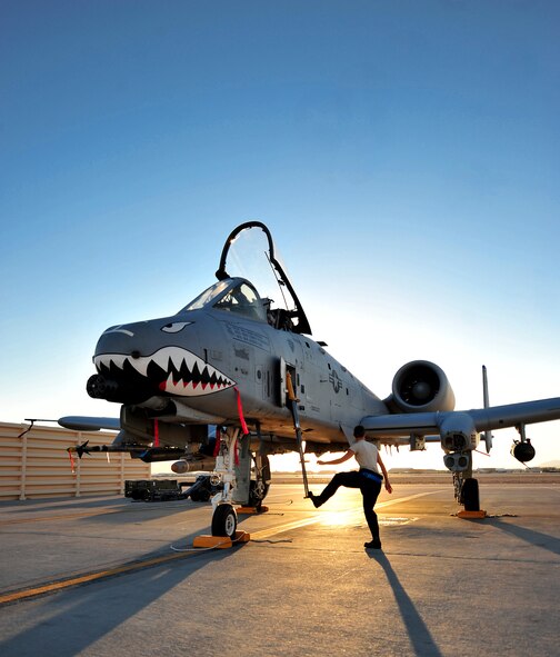 U.S. Air Force Airman 1st Class Grace Wheeler, a crew chief with the 23d Aircraft Maintenance Squadron, 74th Aircraft Maintenance Unit, performs a post-flight inspections on an A-10C Thunderbolt II, following a training mission at the Nevada Training and Test Range July 16, 2012.  The 23d AMXS/74th AMU is deployed to Nellis AFB, Nev., in support of the Red Flag 12-4 exercise, which runs July 16-27, 2012. During post-flight inspections, crew chiefs check the serviceability of the aircraft by checking the tires, looking for cracks and leaks. (U.S. Air Force photo by Staff Sgt. Stephanie Mancha/Released)