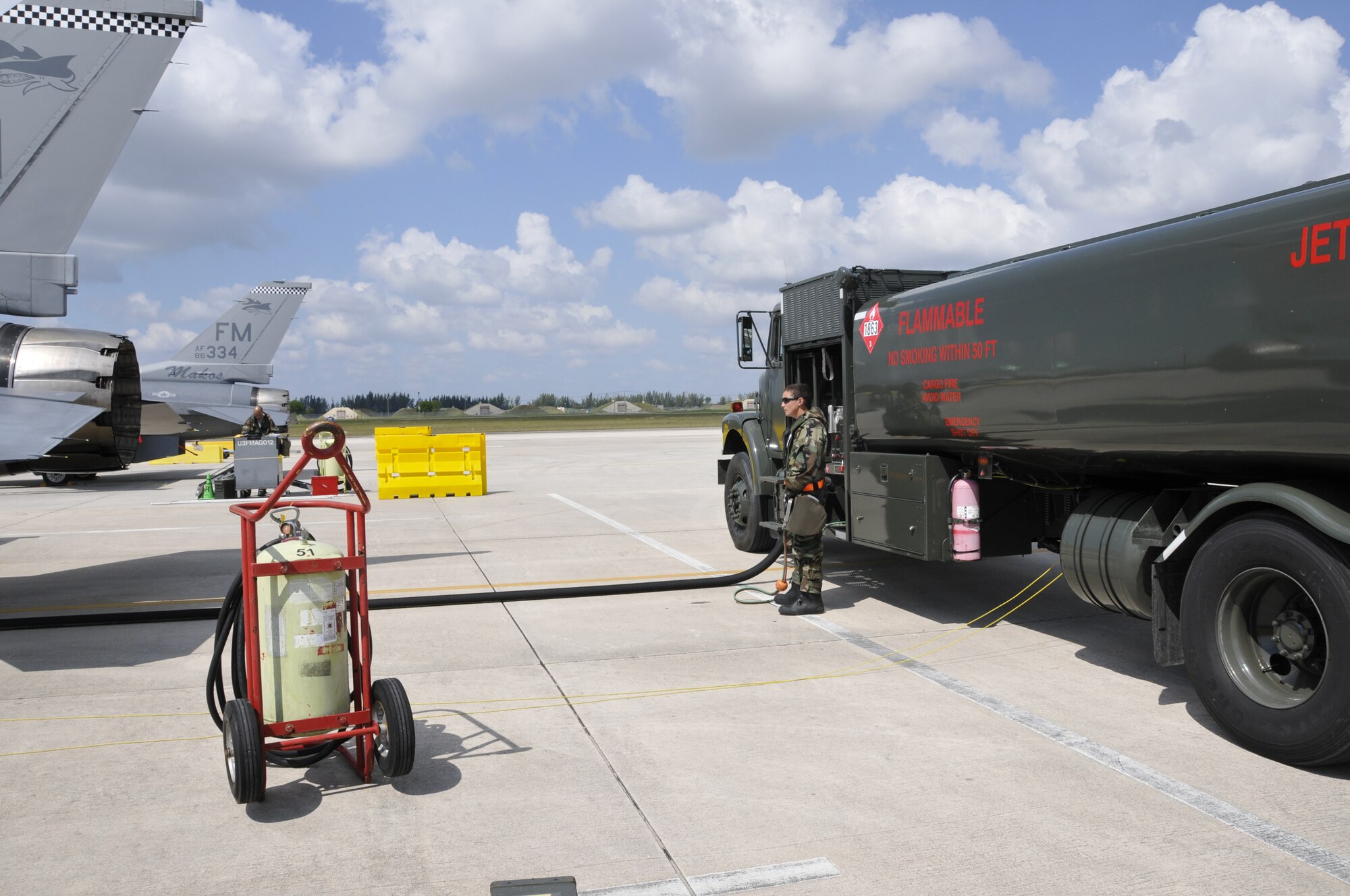 Senior Airman Melissa Franco, a fuels journeyman assigned to the 482nd Fuel Management Flight prepares to refuel an F-16 during a recent Operational Readiness Inspection at Homestead Air Reserve Base (U.S. Air Force photo/Tim Norton)