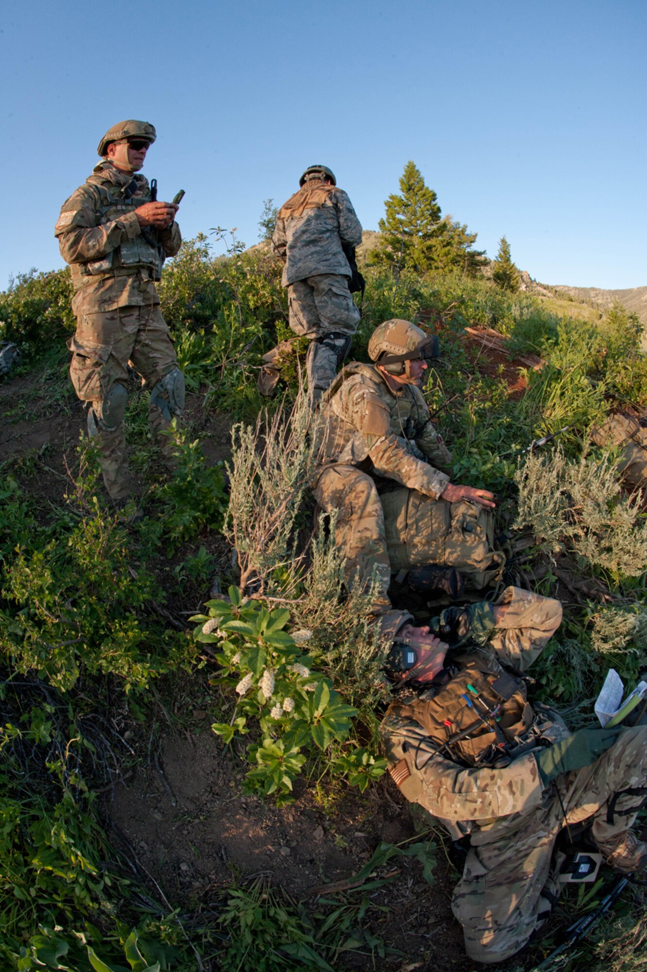 Members of the 124th Air Support Operations Squadron (ASOS) of the Idaho Air National Guard participate in intensive outdoor training during exercise Mountain Fury II throughout the Idaho Sawtooth National Forest, June 25. Members of ASOS perform small unit tactics, mounted patrol with HMWVVs, Close Air Support missions, and over watch with the help of the 190th Fighter Squadron’s A-10 Aircraft and B Company, 1-214th General Support Aviation Battalion (GSAB) CH-47 Chinook Helicopters, Idaho Army National Guard Apache Helicopters and 728th Air Control Squadron, Mt. Home, June 19 through June 27.