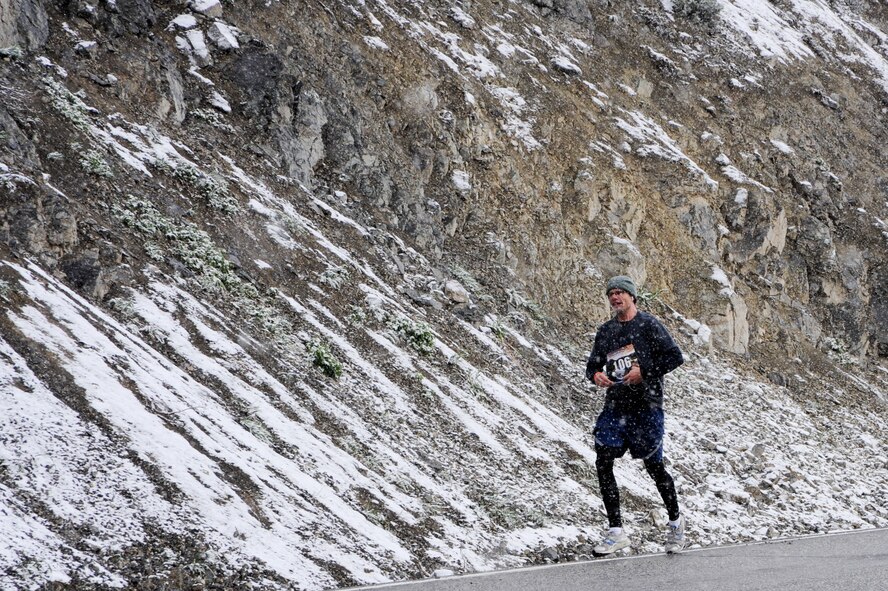 Staff Sgt. Robert Barney finishes the first of his two legs on a 62-mile relay race as part of team “For Wallace,” an Idaho Air National Guard team, on June 9, in the Sawtooth Mountain range, Idaho. Sergeant Barney is a member of the 124th Fighter Wing and is competing with fellow teammates from the Idaho Air Guard who are the single largest organization to participate in the 2012 Sawtooth Relay race, which had 6-person teams covering 62-miles through central Idaho, from Stanley to Sun Valley over elevations as high as 8700 feet.