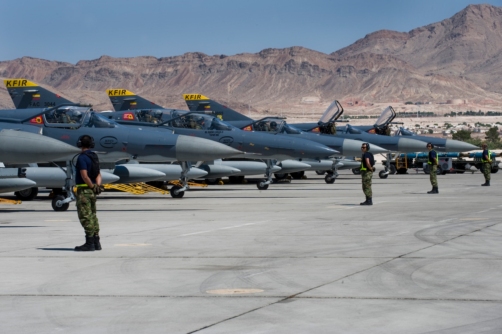 Colombian Air Force Kfir aircraft prepare for a mission during Red Flag 12-4 July 18, 2012, at Nellis Air Force Base, Nev. A U.S. Air Force pilot rides in the backseat of a Kfir on each mission to provide guidance on Nellis specific procedures. (U.S. Air Force photo by Staff Sgt. William P.Coleman)
  

