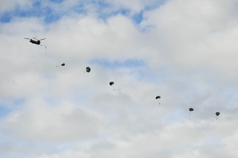 SOTO CANO AB, Honduras – Paratroopers descend to the drop zone during a combined airborne exercise between U.S. Army and Honduran army soldiers at Joint Task Force-Bravo.  (U.S. Air Force photo by 1st Lt. Christopher Diaz)