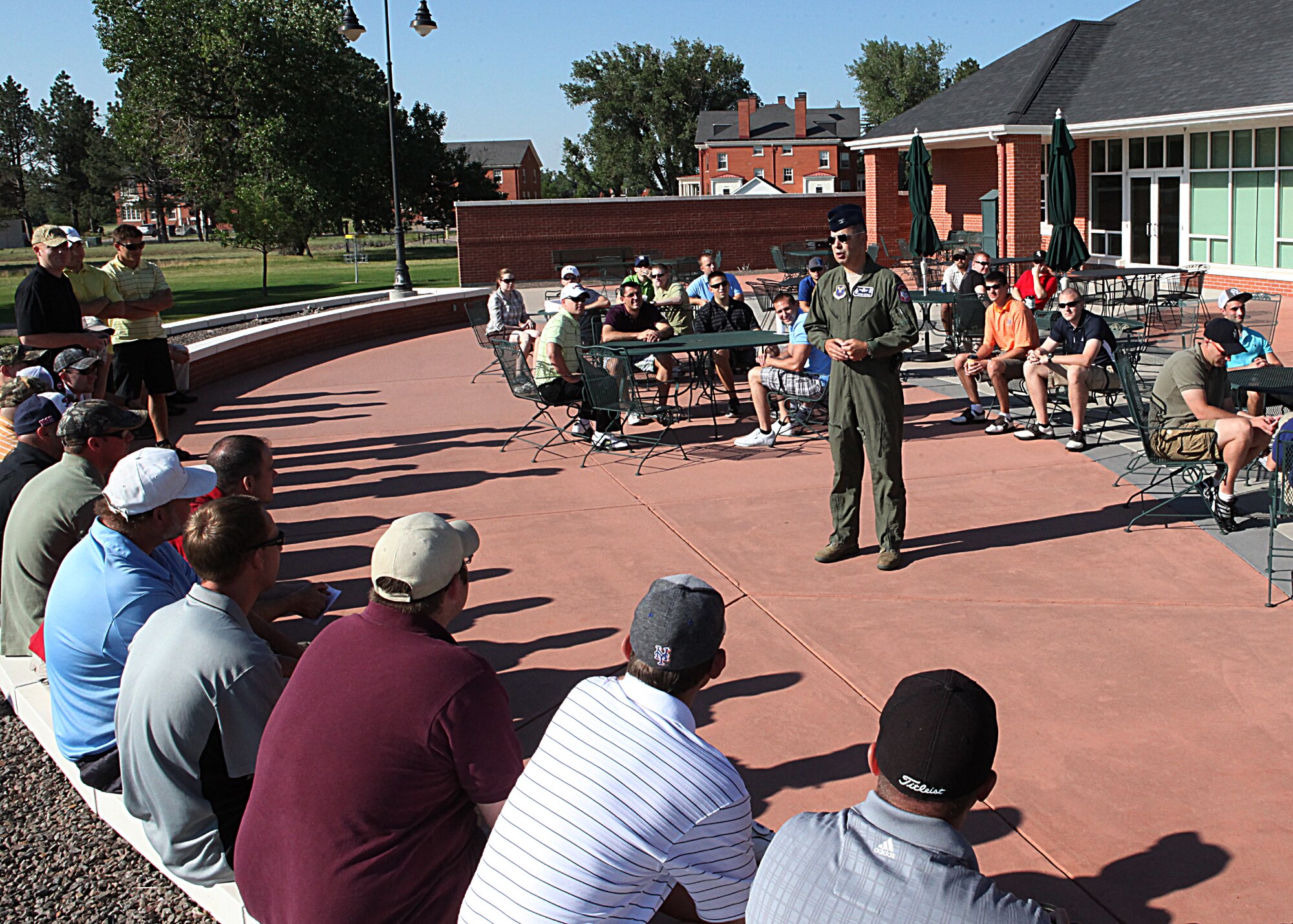 Col. George Farfour, 90th Missile Wing vice commander, speaks to a group of golfers prior to teeing off for the Globals Strike Challenge golf tournament Thursday, July 12 at F. E. Warren Air Force Base golf course.(U.S. Air Force photo by Matt Bilden)