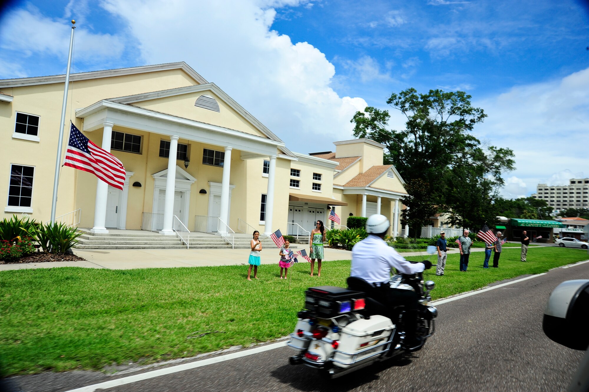 A Hillsborough County Sheriff deputy escorts Army Staff Sgt. Ricardo Seija's procession off MacDill Air Force Base into Tampa, Fla., on Bayshore Boulevard July 17, 2012. Since 2009 the Hillsborough County Sheriff's department has made it their responsibility to see that any fallen hero returning home is met by fellow brother-in-arms and is honorably escorted to their final resting place. (U.S. Air Force photo by Staff Sgt. Angela Ruiz)