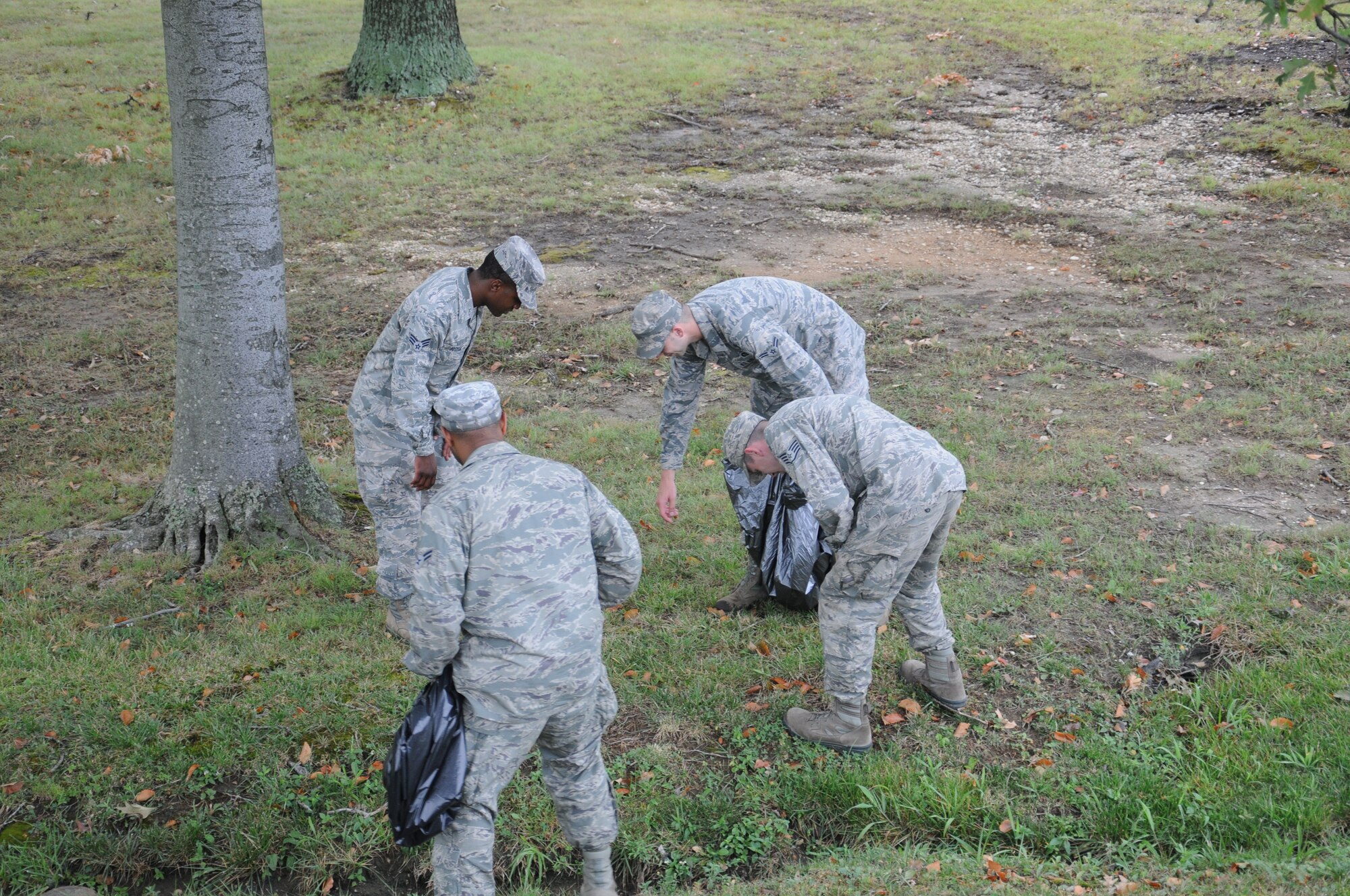 JOINT BASE ANDREWS, Md.,- Members from Joint Base Andrews participate in a base-wide clean-up, July 20, 2012, here. The clean-up is part of a continuing effort to maintain the beatification of the base. (U.S. Air Force photo/Senior Airman Katie Spencer)