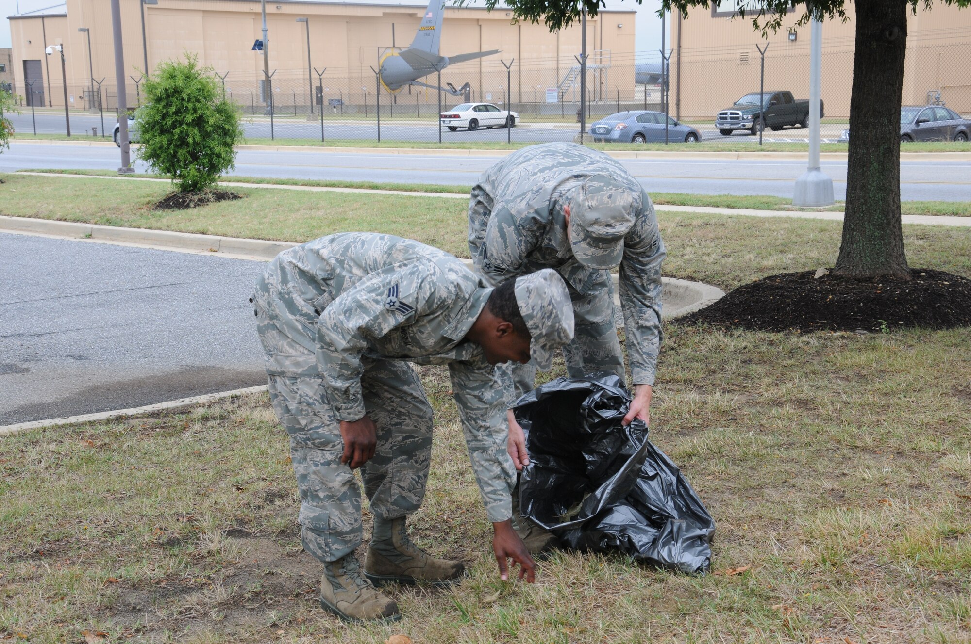 JOINT BASE ANDREWS, Md.,- Members from Joint Base Andrews participate in a base-wide clean-up, July 20, 2012, here. The clean-up is part of a continuing effort to maintain the beatification of the base. (U.S. Air Force photo/Senior Airman Katie Spencer)