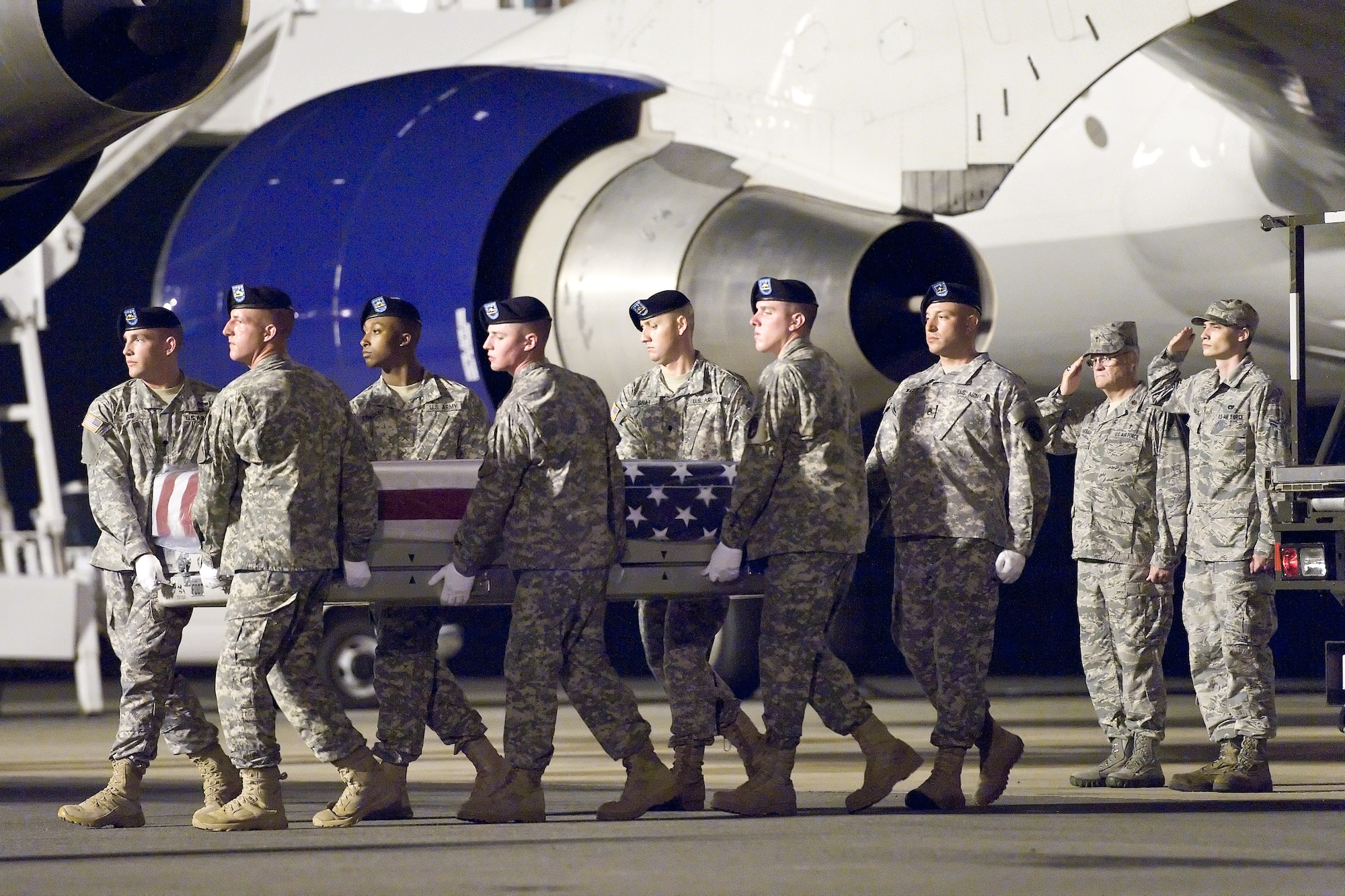 A U.S. Army carry team transfers the remains of Sgt. Daniel A. Rodriguez, of Baltimore, Md., at Dover Air Force Base, Del., July 19, 2012. Rodriguez was assigned to the 548th Combat Sustainment Support Battalion, 10th Sustainment Brigade, 10th Mountain Division, Fort Drum, N.Y. (U.S. Air Force photo/Roland Balik)

