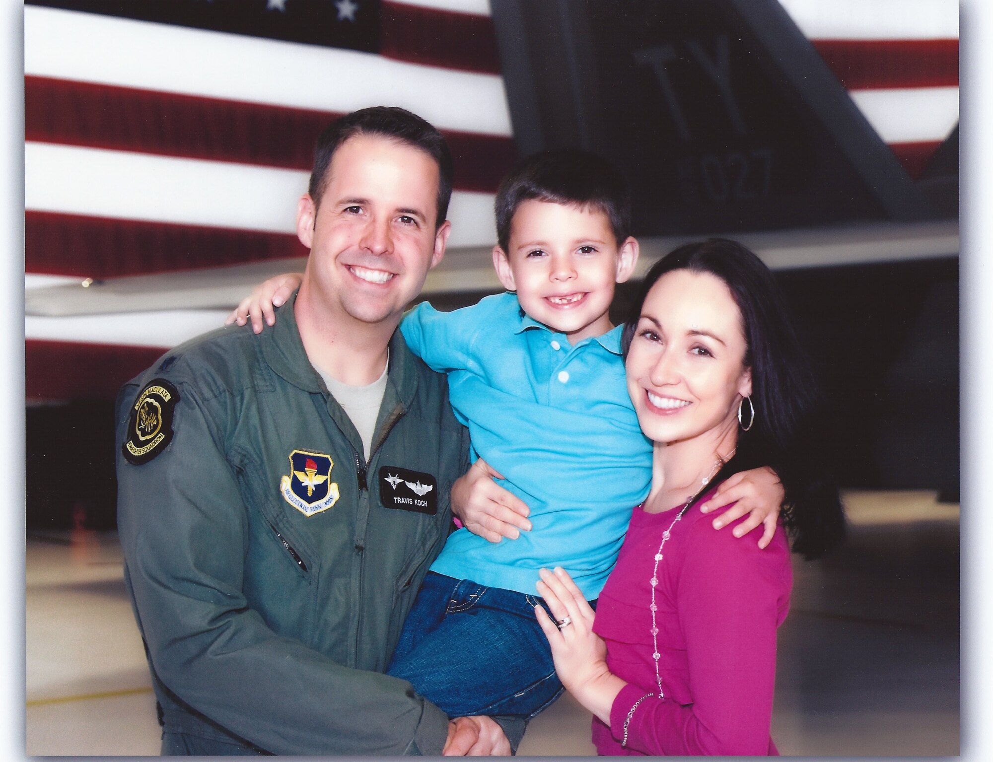 (Above) Lieutenant Col. Richard Koch, his wife Amanda, and his son John (7). Colonel Koch assumed command of the 43rd Fighter Squadron in a change of command ceremony, July 20. (Courtesy photo)