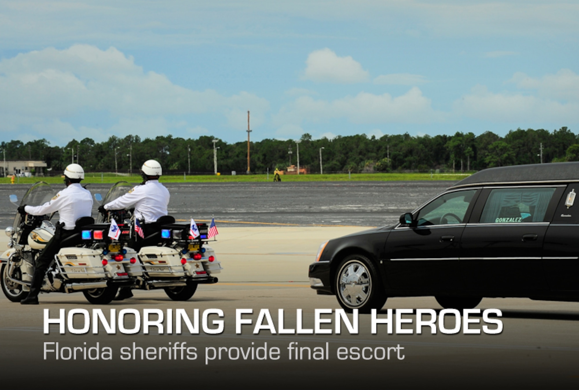 Hillsborough Sheriff's County deputies escort a hearse carrying a fallen Solider Army Staff Sgt. Ricardo Seija’s remains from the flightline at MacDill Air Force Base’s , July 17, 2012. Seija died July 8, of wounds suffered from an improvised explosive device when enemy forces attacked his unit in Maidan Shahr, Wardak province, Afghanistan., He was 31-years-old. (U.S. Air Force photo by Staff Sgt. Angela Ruiz) 