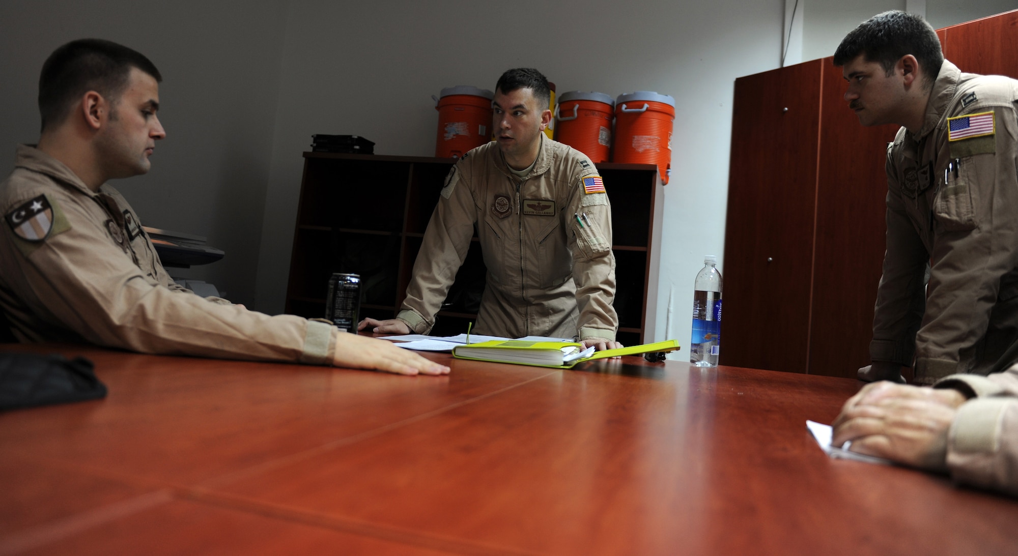 Capt. Kevin Gallaway, 817th Expeditionary Airlift Squadron pilot, briefs crew members prior to a flight July 13, 2012, at Incirlik Air Base, Turkey. The 817th EAS has approximately 100 Airmen who operate out of Incirlik as well as the Transit Center at Manas,Kyrgyzstan, is a tenant unit to the 39th Air Base Wing. (U.S. Air Force photo by Senior Airman Jarvie Z. Wallace/Released) 