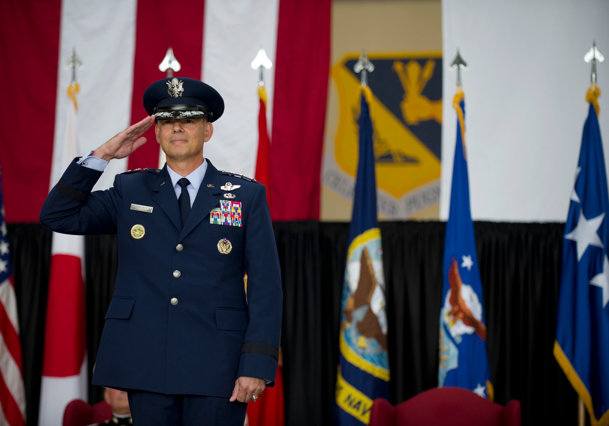 YOKOTA AIR BASE, Japan -- Lt. Gen Sam Angelella, incoming U.S. Forces, Japan,and 5th Air Force commander, renders his first salute during a change of command ceremony at Yokota Air Base, Japan, July 20, 2012. (U.S. Air Force photo by Staff Sgt. Stacy Moless)  