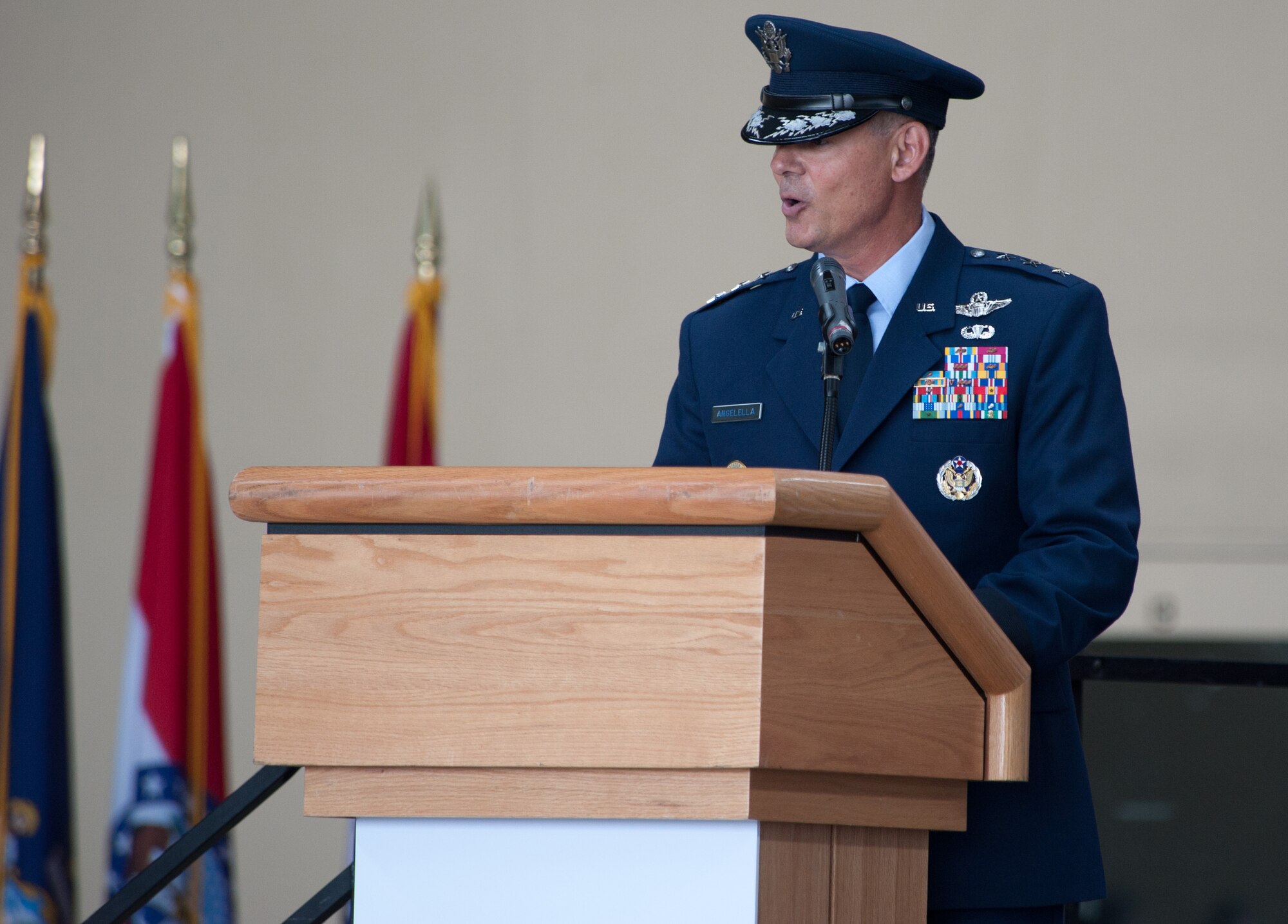 YOKOTA AIR BASE, Japan -- Lt. Gen. Sam Angelella, U.S. Forces, Japan, and 5th Air Force commander, gives a speech during a change of command ceremony at Yokota Air Base, Japan, on July 20, 2012. Angelella served as the vice director for Strategic Plans and Policy on the Joint Staff at the Pentagon prior to his current assignment. (U.S. Air Force photo by Airman 1st Class John D. Partlow)
