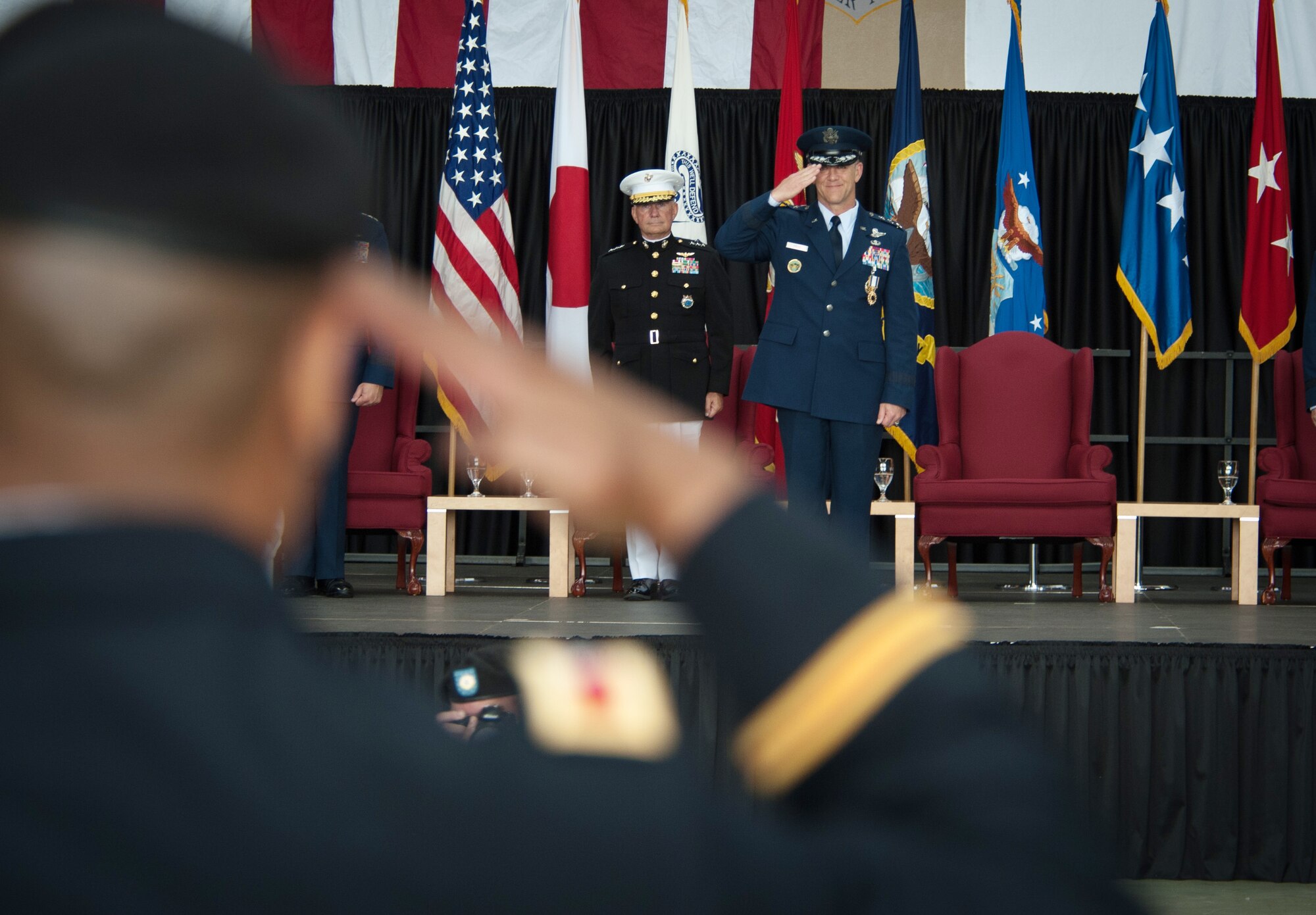 YOKOTA AIR BASE, Japan -- Lt. Gen. Burton M. Field, U.S. Forces, Japan, and 5th Air Force commander, gives his final salute as commander during a change of command ceremony at Yokota Air Base, Japan, on July 20, 2012. Field will become the deputy chief of staff for Operations, Plans and Requirements at Headquarters, U.S. Air Force at the Pentagon. (U.S. Air Force photo by Airman 1st Class John D. Partlow)