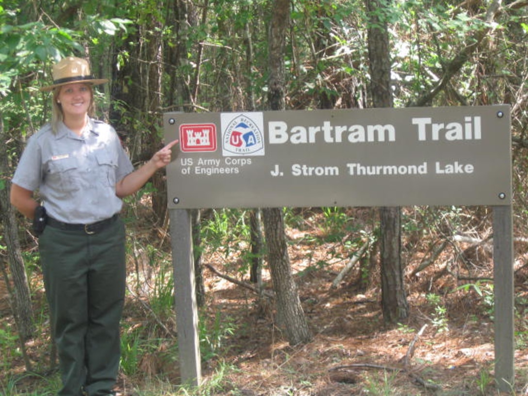 CLARK HILLS, S.C. — Krista McCuen, U.S. Army Corps of Engineers Savannah District Park Ranger, stands next to a trail marker at the Bartram Trail, which was designated as a National Recreation Trail by the Department of the Interior.