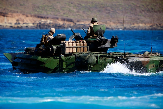 An Assault Amphibious Vehicle with AAV platoon, India Company, Battalion Landing Team 3/5, 15th Marine Expeditionary Unit, prepares to suppress targets on San Clemente Island, July 20. The AAV platoon practiced water gunnery, an advanced level of AAV gunnery, in preparation for the 15th MEU’s upcoming deployment. The training was part of Composite Training Unit Exercise, the second at-sea period the 15th MEU and Peleliu Amphibious Ready Group have conducted since the MEU formed a Marine Air Ground Task Force in February. The training will prepare the two units to function as a blue-green team, capable of conducting a wide-variety of worldwide missions ranging from humanitarian aid to combat.