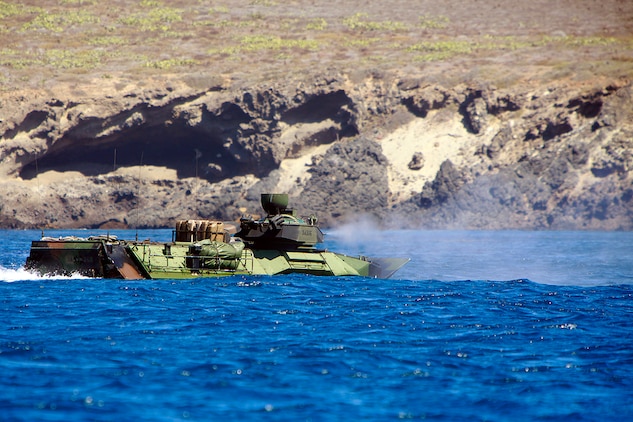 ::r::::n::An Assault Amphibious Vehicle with AAV platoon, India Company, Battalion Landing Team 3/5, 15th Marine Expeditionary Unit, suppresses targets on San Clemente Island, July 20. The AAV platoon practiced water gunnery, an advanced level of AAV gunnery, in preparation for the 15th MEU’s upcoming deployment. The training was part of Composite Training Unit Exercise, the second at-sea period the 15th MEU and Peleliu Amphibious Ready Group have conducted since the MEU formed a Marine Air Ground Task Force in February. The training will prepare the two units to function as a blue-green team, capable of conducting a wide-variety of worldwide missions ranging from humanitarian aid to combat.