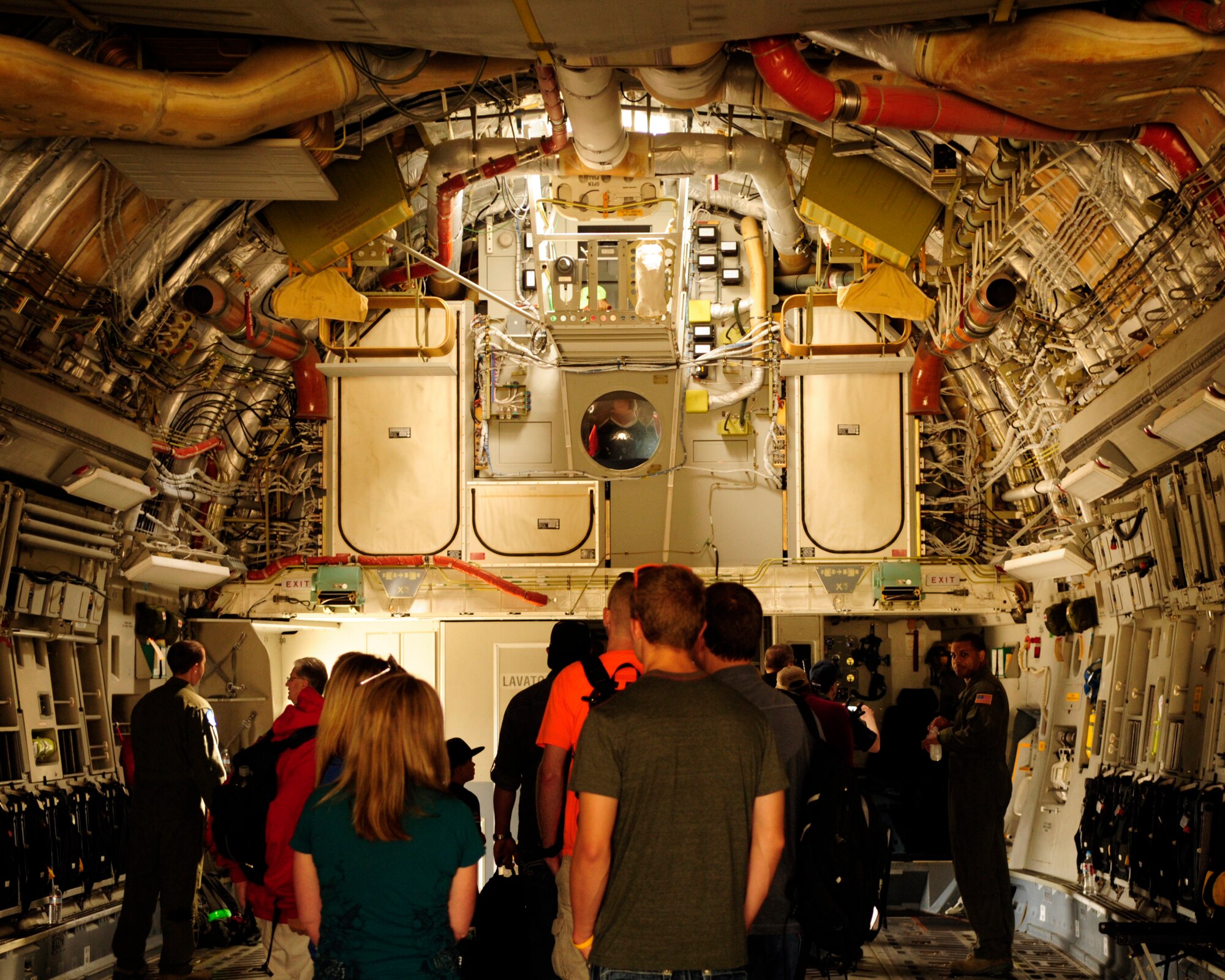 Visitors wait in line to see the cockpit of a C-17 Globemaster III July 21, 2012, at McChord Field, Wash. The C-17 was one of more than 40 static aircraft displays at the 2012 Joint Base Lewis-McChord Air Expo. (U.S. Air Force photo/Staff Sgt. Frances Kriss)