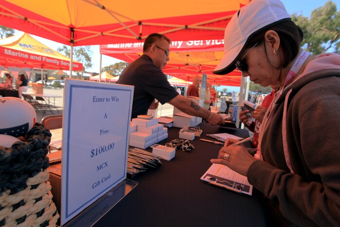 Service members and their families attending the 13th annual Community Day Celebration were able to enter and sign-up to win prizes at the the various booths at the San Onofre Community Center, July 21. A raffle was held throughout the day offering prizes from gift certificates to video game systems.