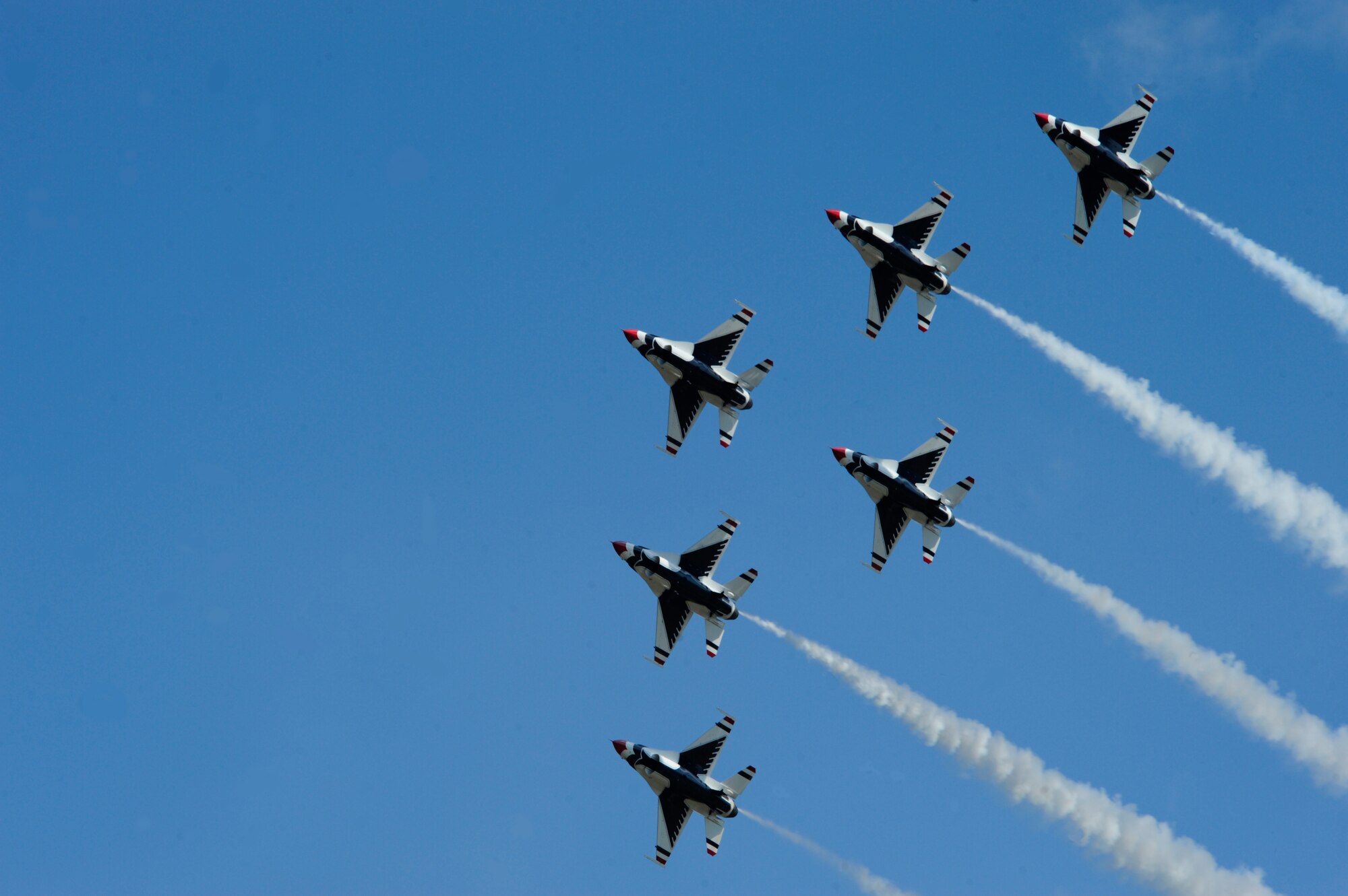 The U.S. Air Force Thunderbirds perform their delta formation July 21, 2012, during the 2012 Joint Base Lewis-McChord Air Expo at McChord Field, Wash. (U.S. Air Force photo/Staff Sgt. Frances Kriss)
