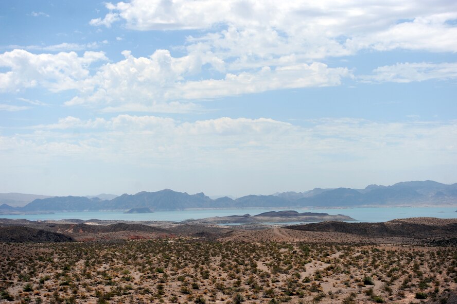 Lake Mead National Recreation Area became the first national recreation area in 1964, and the reservoir was created by the damming of the Colorado River.  A kayaking trip July 21, 2012, served as a way for Red Flag exercise participants to get away from the hustle and bustle of the exercise and enjoy a relaxing time on the open water. Red Flag kayakers enjoyed a picnic lunch, hiking, cliff diving and swimming at a nearby beach in the reservoir.  (U.S. Air Force photo by Master Sgt. Sonny Cohrs/Released)
