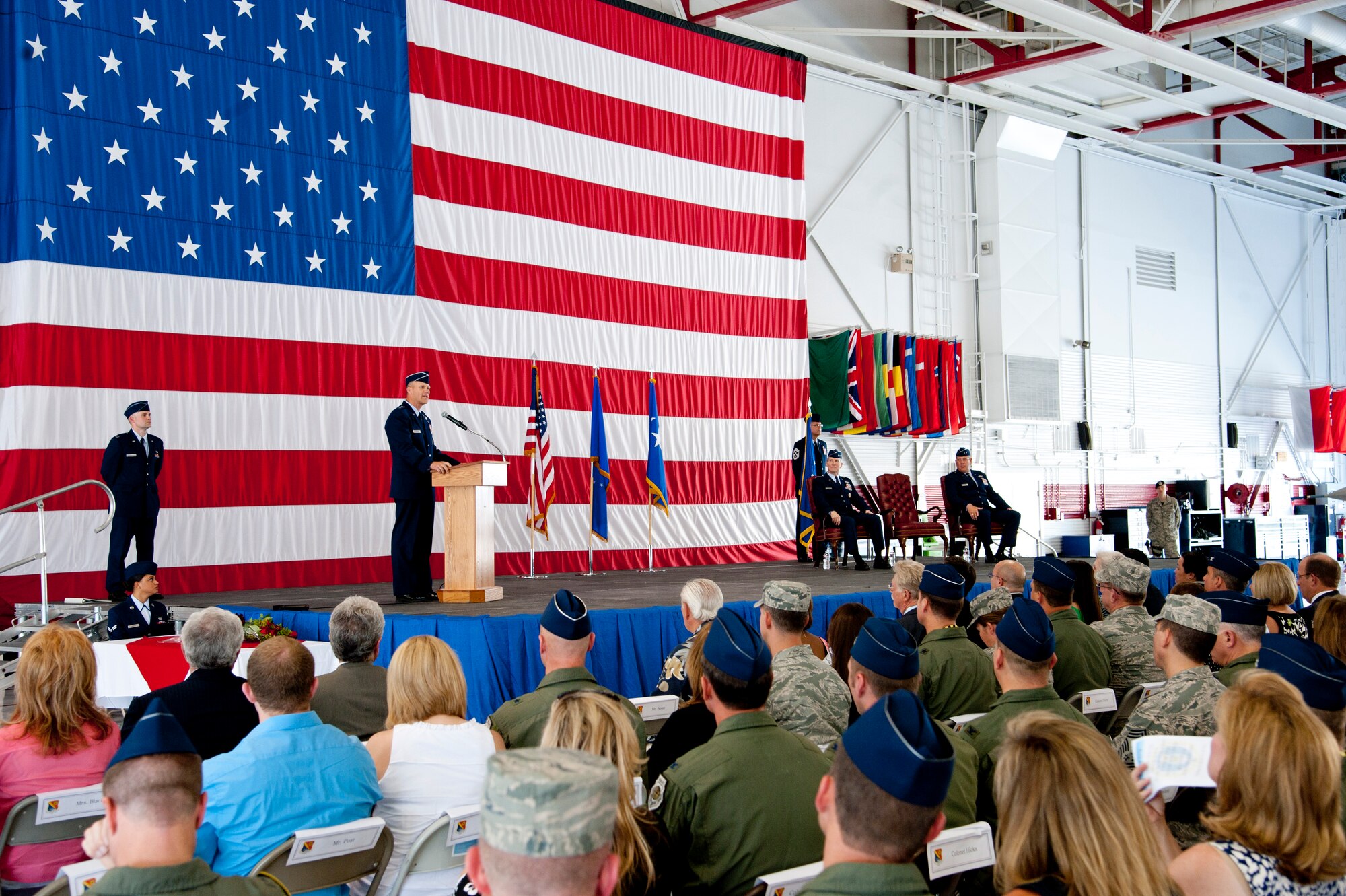 U.S. Air Force Maj. Gen. Jeffrey Lofgren, U.S. Air Force Warfare Center commander, addresses the crowd after assuming command of the AFWC at a ceremony July 20, 2012, at Nellis Air Force Base, Nev. Lofgren is a command pilot with more than 3,000 flight hours in the F-16, KC-10 and training aircraft. (U.S. Air Force photo by Master Sgt. Jason W. Edwards/Released)