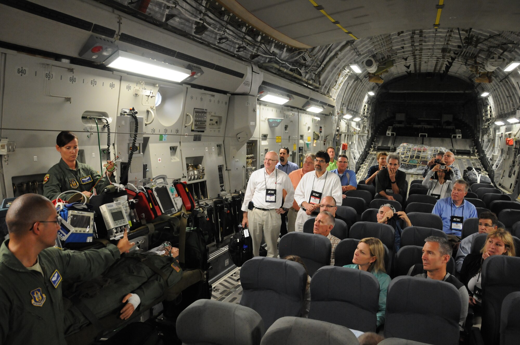JOINT BASE ANDREWS, Md.,- Members from the 459th Aeromedical Evacuation Squadron here, brief a group from the Joint Civilian Orientation Conference on the process of an aeromedical evacuation aboard a C-17 Globemaster III aircraft, July 23, 2012. Participants of JCOC are guests of the Secretary of Defense and gain hands-on experience through operations and interactions with troops and military leaders stationed throughout the United States. (U.S. Air Force photo/Senior Airman Katie Spencer)
