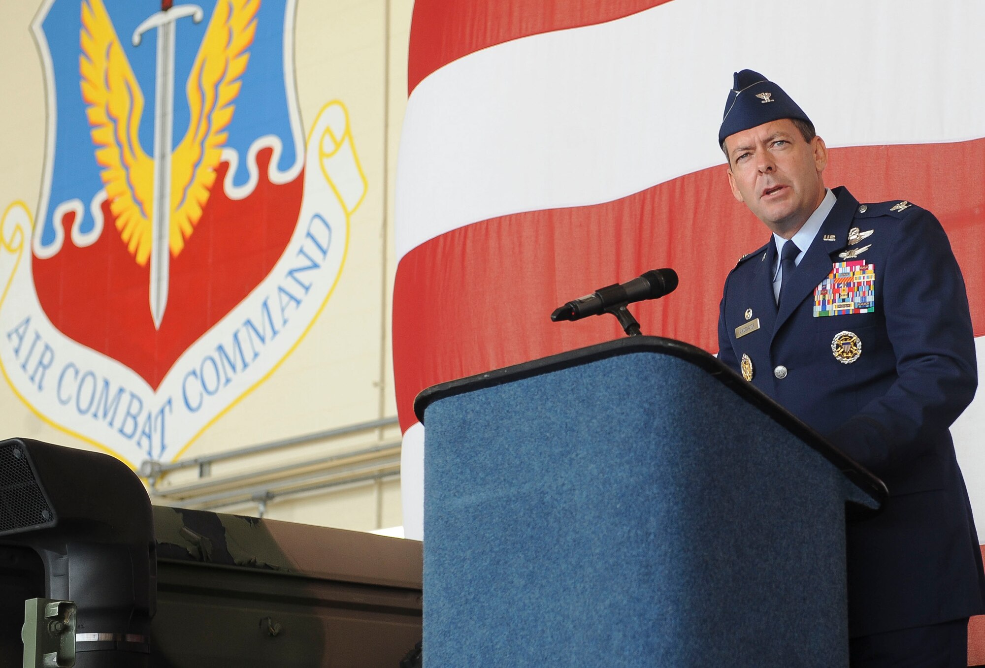 U.S. Air Force Col. Scott Kindsvater outgoing 93d Air Ground Operations Wing commander, speaks at the change of command ceremony at Moody Air Force Base, Ga., July 20, 2012. Kindsvater leaves Moody to become the deputy chief of support and security assistance for the defense representative in Pakistan. (U.S. Air Force photo by Staff Sgt. Ciara Wymbs/Released)