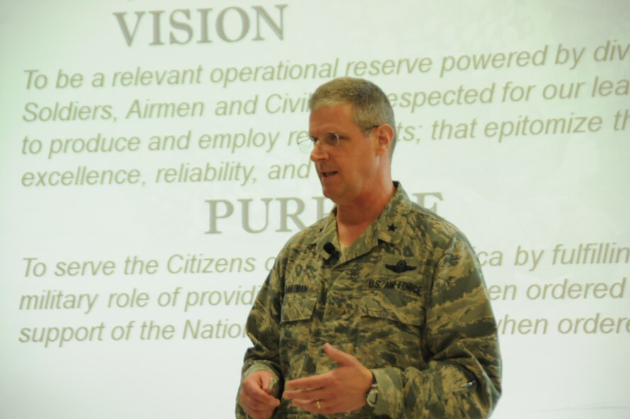 Assistant Adjutant General for Ohio Air National Guard, Brig. Gen. Mark E. Bartman, speaks to employers of the Ohio National Guardsmen purpose  and mission of the National Guard at the 180th Fighter Wing, Toledo, Ohio, July 18, 2012. Employers were nominated to participate in the in-depth tours of the 180FW and Camp Perry, for their outstanding support of Ohio National Guardsmen. The ESGR mission is to build and maintain positive relationships with employers of guard and reserve members. (U.S. Air Force photo by Senior Airman Amber Williams/Released)