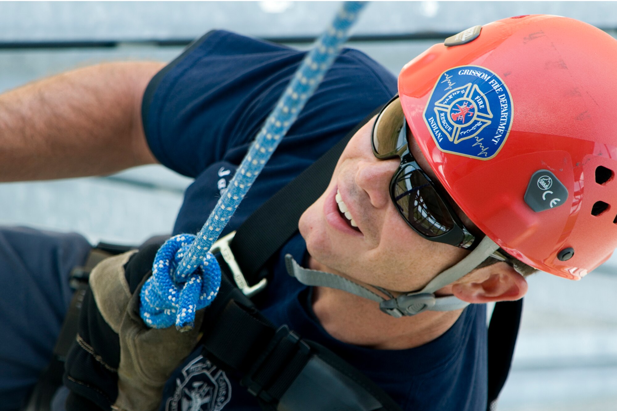 GRISSOM AIR RESERVE BASE, Ind. -- Robert Jacobs, Grissom firefighter, rappels down the base radar tower July 11. The Grissom Fire Department tested new harnesses used for rescue operations. (U.S. Air Force photo/Senior Airman Andrew McLaughlin)
