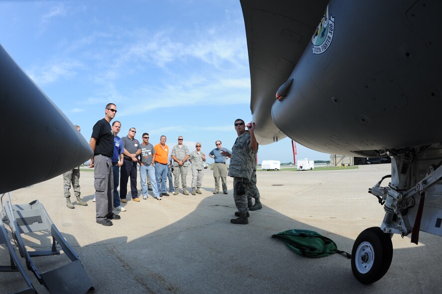 Employers of Ohio Army and Air National Guardsmen get an up-close look at an F-16 Fighting Falcon during a Joint Employer Support of the Guard and Reserve Event at the 180th Fighter Wing, Toledo, Ohio, July 18, 2012.  Employers were nominated to participate in the in-depth tours of the 180FW and Camp Perry, for their outstanding support of Ohio National Guardsmen. The ESGR mission is to build and maintain positive relationships with employers of guard and reserve members. (U.S. Air Force photo by Senior Airman Amber Williams/Released)