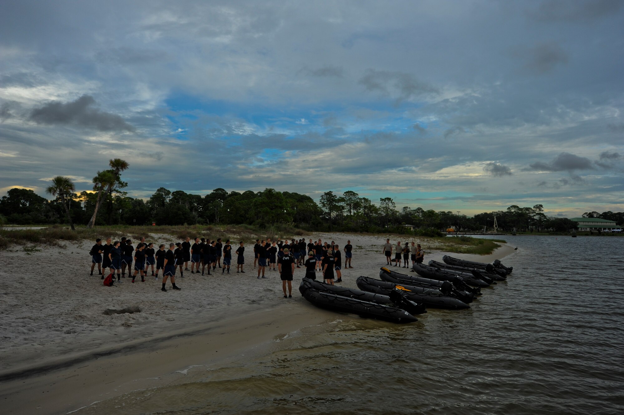 Cadets from the Pensacola Air Force Junior ROTC, get briefed by cadre July 19, 2012, at the Marina on Hurlburt Field, Fla. From July 16-20, more than 40 cadets from Pensacola Air Force Junior ROTC visited base for their Summer Leadership School -- a course designed to teach cadets leadership, confidence and other traits. (U.S. Air Force photo by Staff Sgt. David Salanitri/ Released)