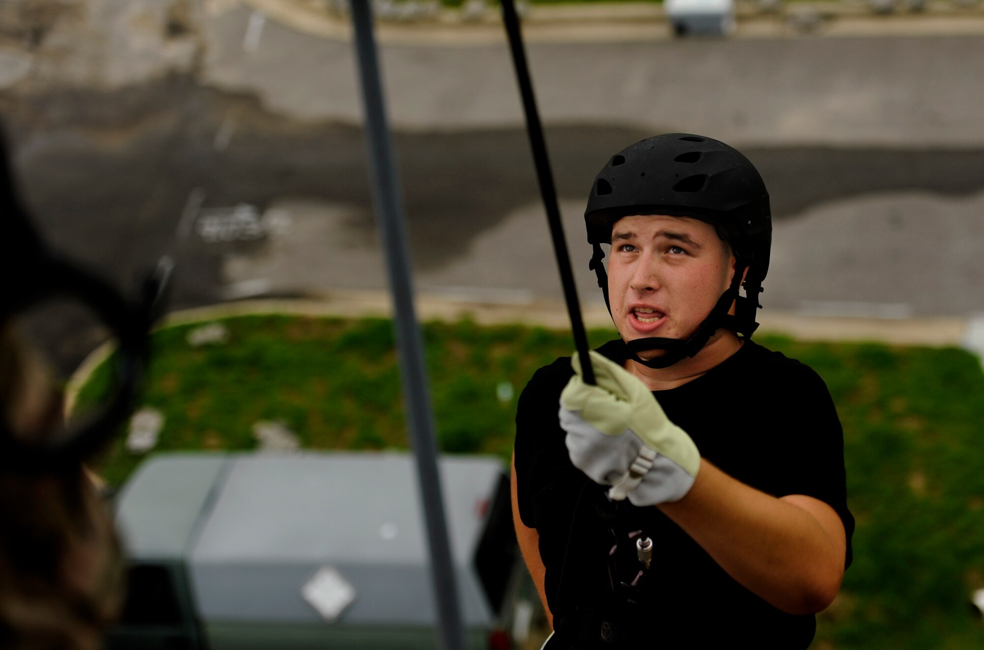 A cadet with the Pensacola Air Force Junior ROTC program, rappels down a wall at the 23rd Special Tactics Squadron, July 18, 2012, Hurlburt Fiedl, Fla. From July 16-20, more than 40 cadets from Pensacola Air Force Junior ROTC visited base for their Summer Leadership School -- a course designed to teach cadets leadership, confidence and other traits.(U.S. Air Force photo by Staff Sgt. David Salanitri/ Released)