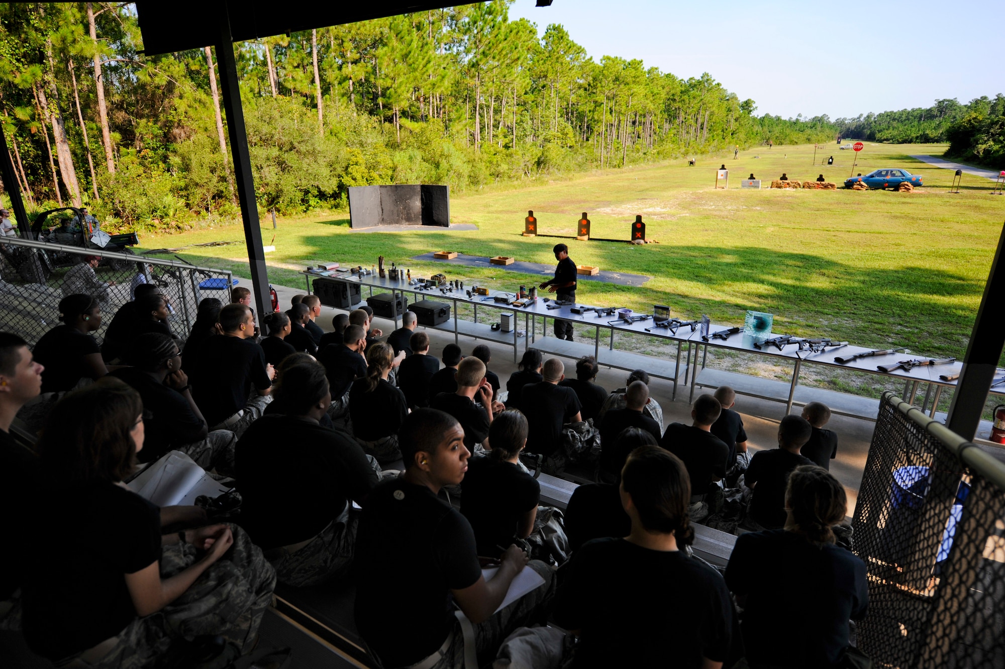 Cadets from Pensacola Air Force Junior ROTC learn the techniques used by terrorist throughout the world, July 17, 2012, at Hurlburt Field, Fla. From July 16-20, more than 40 cadets from Pensacola Air Force Junior ROTC visited base for their Summer Leadership School -- a course designed to teach cadets leadership, confidence and other traits.(U.S. Air Force photo by Staff Sgt. David Salanitri/ Released)