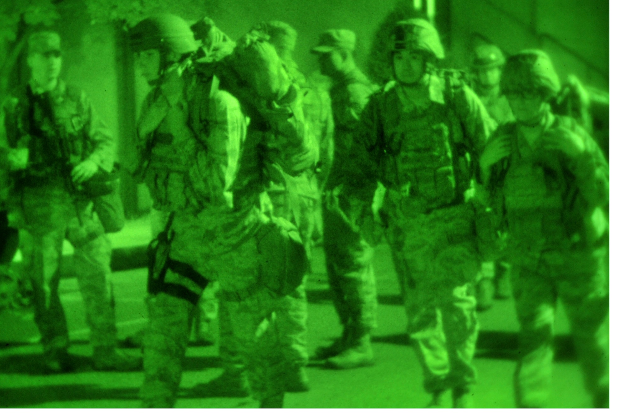 Airmen from the 51st Security Forces Squadron gear up for exercise Beverly Midnight 12-03, July 22, 2012. The exercise tests Osan’s ability to defend the base and conduct daily operations during a heightened state of readiness. This is the third exercise for Osan in 2012. (U.S. Air Force photo/Staff Sgt. Stefanie Torres)