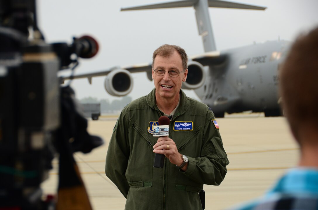 WRIGHT-PATTERSON AIR FORCE BASE, Ohio – Col. Stephen Goeman, 445th Airlift Wing commander, is interviewed by local media about the Ability to Survive and Operate (ATSO) exercise July 14. The exercise tested the response of the wing’s Airmen to chemical and conventional attacks that might occur in an overseas theater of operations and also included the launch and recovery of four C-17 Globemaster III aircraft. (U.S. Air Force photo/Staff Sgt. Mikhail Berlin)