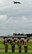 Airmen from Royal Air Force Lakenheath, England, salute the last active B-17 Flying Fortress in Europe as it flies over the former Knettishall Airfield on July 14, 2012. The fly-over was part of the 388th Bombardment Group memorial re-dedication at Coney Weston, England. (U.S. Air Force photo/Staff Sgt. Megan P. Lyon)