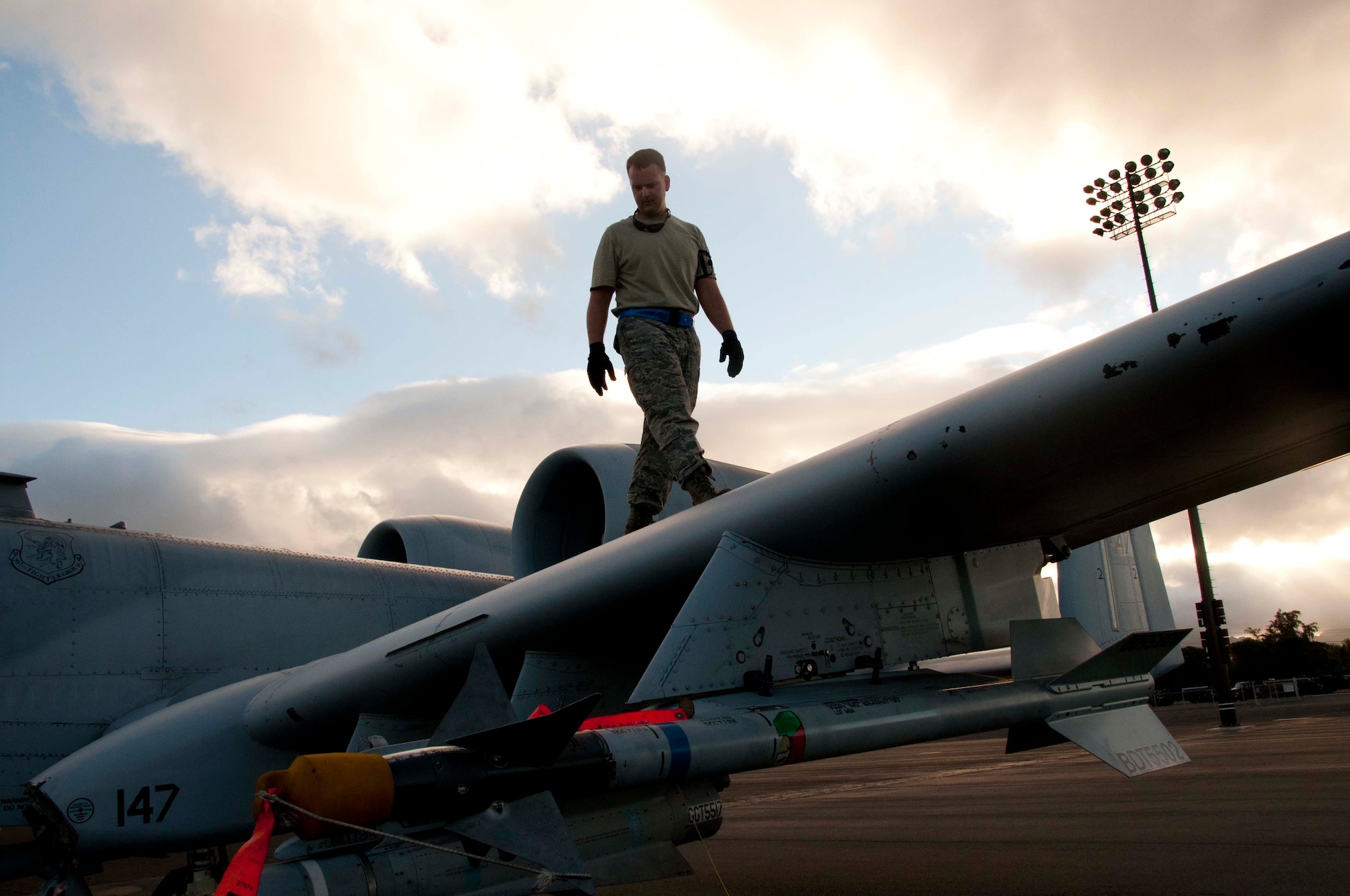 U.S. Air Force Staff Sgt. Justin Browning, 917th Maintenance Squadron crew chief, conducts a pre-flight inspection of an A-10 Thunderbolt II in preparation for a sortie during the Rim of the Pacific military exercise at Joint Base Pearl Harbor-Hickam, Hawaii, July 17, 2012.  Twenty-two nations, more than 40 ships and submarines, more than 200 aircraft and 25,000 personnel are participating in RIMPAC exercise from June 29 to Aug. 3, in and around the Hawaiian Islands. The world's largest international maritime exercise, RIMPAC provides a unique training opportunity that helps participants foster and sustain the cooperative relationships that are critical to ensuring the safety of sea lanes and security on the world's oceans. RIMPAC 2012 is the 23rd exercise in the series that began in 1971. (U.S. Air Force photo by Staff Sgt. Ted Daigle)