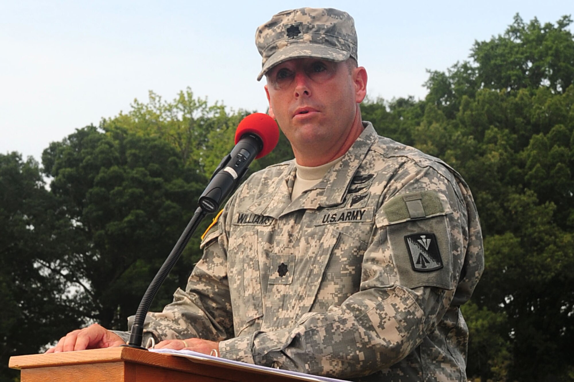 U.S. Army Lt. Col. Michael R. Williams, 1st Battalion, 222nd Aviation Regiment commander, delivers remarks during the change-of-command ceremony at Fort Eustis, Va., July 20, 2012. Williams assumed command from Lt. Col. James E. Huber. (U.S. Air Force photo by Staff Sgt. Ashley Hawkins/Released)