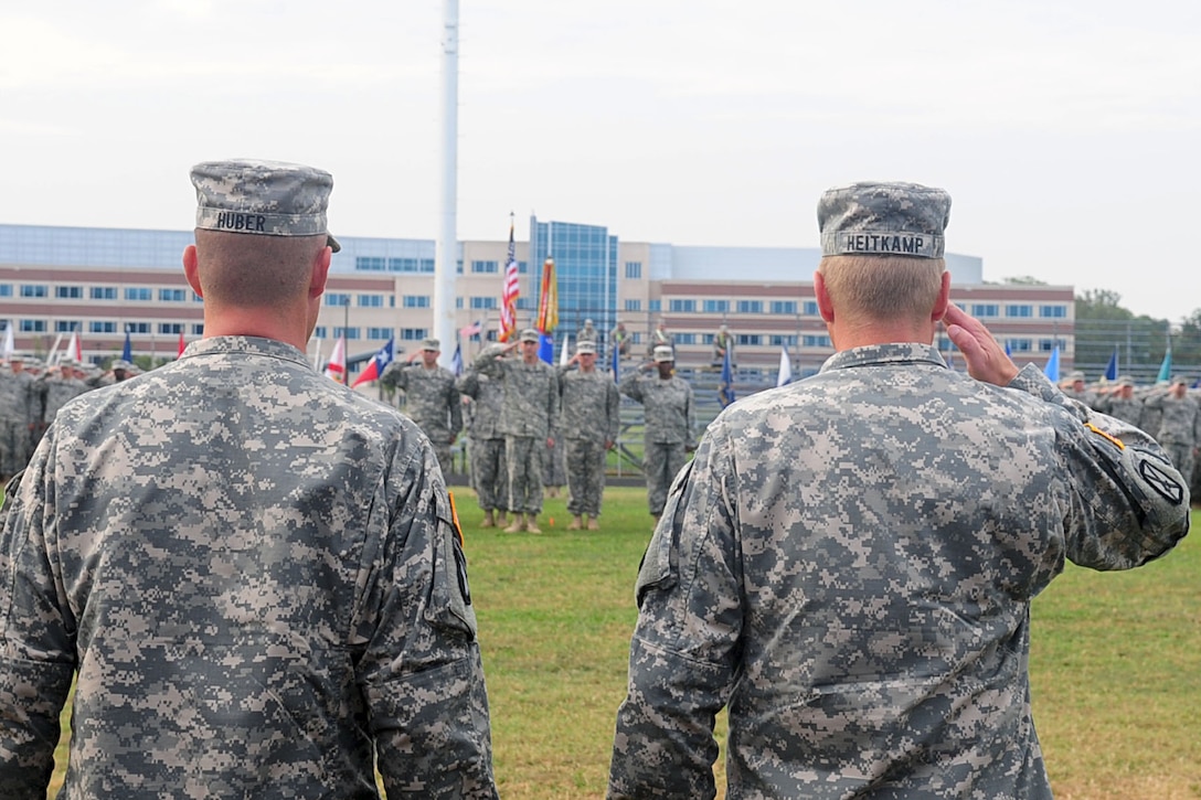 U.S. Army Col. Dean D. Heitkamp, U.S. Army Aviation Logistics School commander, salutes the 1st Battalion, 222nd Aviation Regiment, during the change-of-command ceremony at Fort Eustis, Va., July 20, 2012. The ceremony was held to transfer authority from Lt. Col. James E. Huber to U.S. Army Lt. Col. Michael R. Williams. (U.S. Air Force photo by Staff Sgt. Ashley Hawkins/Released)